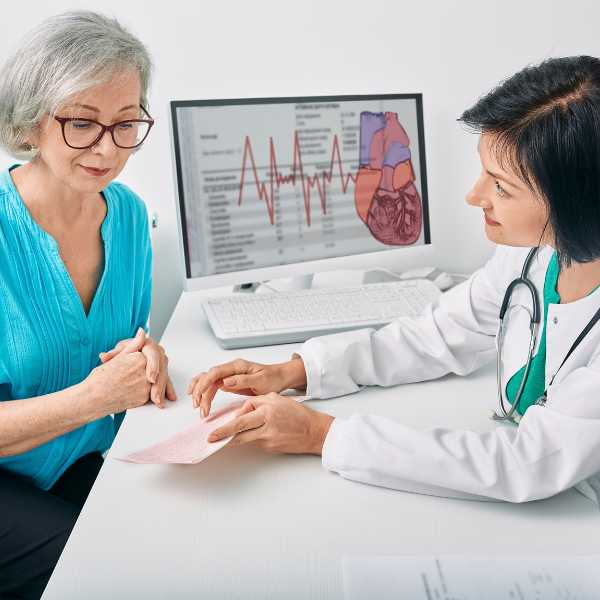 Nurse practitioner discussing cardiology appointment with patient